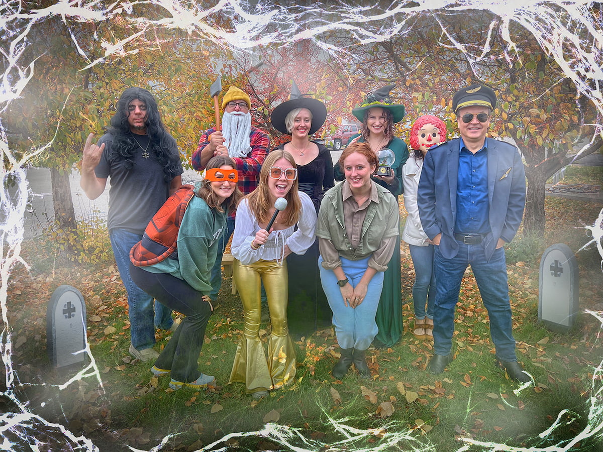 The Insight Creative Team gathered in Halloween costumes