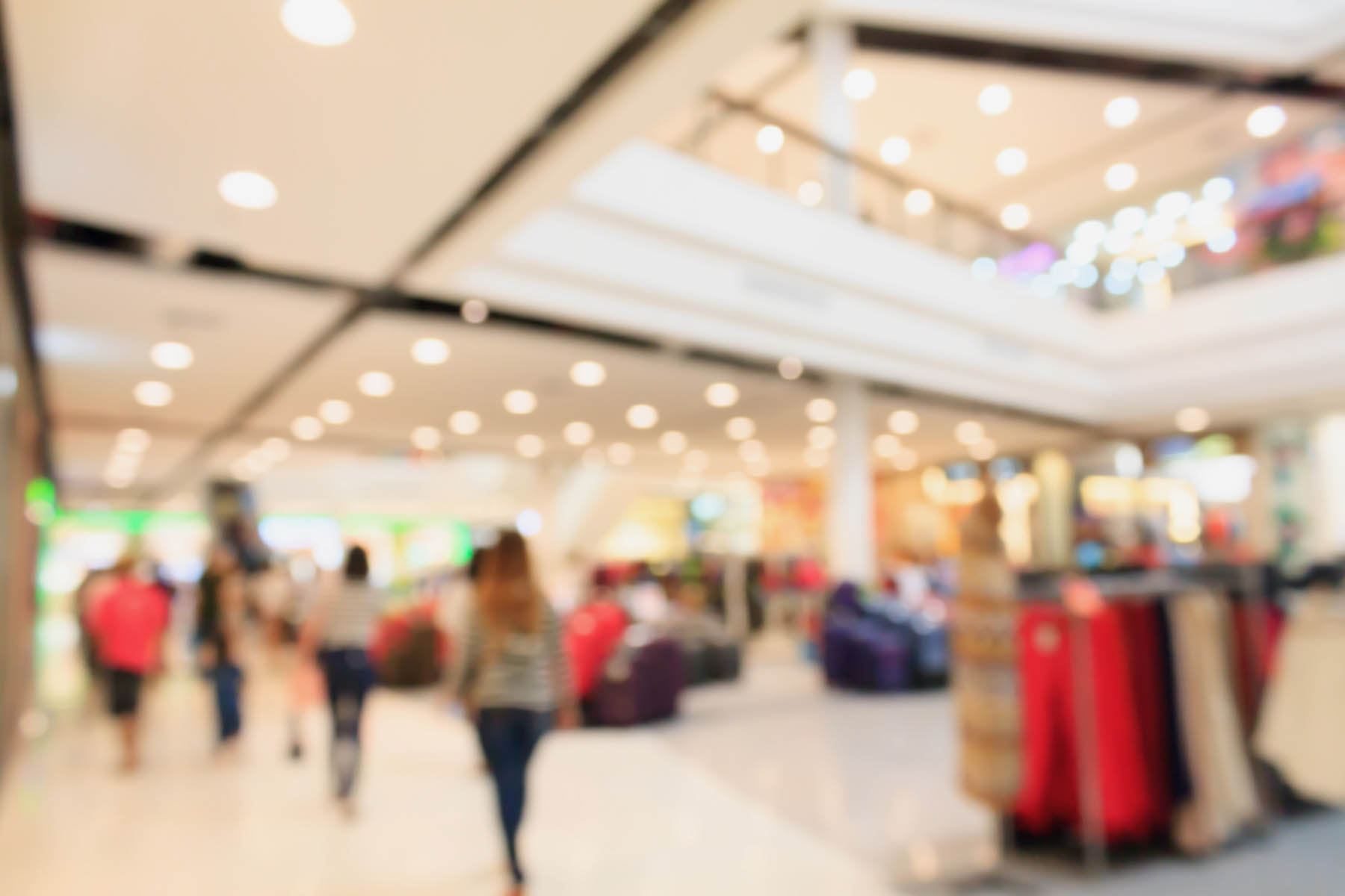 People shopping at a large mall